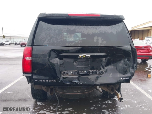 2017 Chevrolet Suburban Premier with VIN 1GNSKJKC4HR162261, listed as a IAAI auction lot 41593672 with 100,136 mi miles. Bid and sale history available at carsss.com. Image 17.