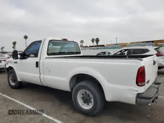 2000 Ford Super Duty F-250 XL with VIN 1FTNF20SXYEE41859, listed as a Copart auction lot 59682704 with 190,234 mi miles and Salvage Title. Bid and sale history available at carsss.com. Image 2.