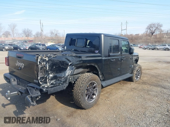 2021 Jeep Gladiator Overland z VIN 1C6HJTFG1ML606215, wystawiony jako IAAI lot #41771646 z przebiegiem 77 411 mil mil oraz . Historia ofert i sprzedaży dostępna na DreamBid. Obrazek 18.