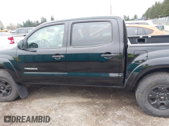 2011 Toyota Tacoma with VIN 3TMLU4EN1BM070300, listed as a IAAI auction lot 41710119 with 199,099 mi miles and . Bid and sale history available at DreamBid. Image 14.