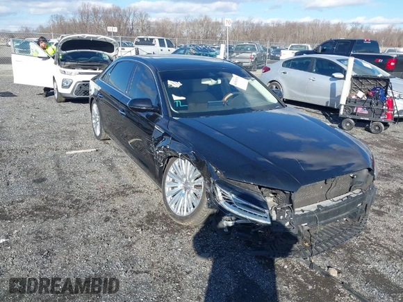 2015 Audi A8 L 4.0T with VIN WAU32AFD4FN014063, listed as a IAAI auction lot 41501970 with 158,570 mi miles. Bid and sale history available at carsss.com. Image 1.