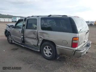 2002 GMC Yukon XL Denali with VIN 1GKFK66U42J264891, listed as a IAAI auction lot 40545926 with 232,303 mi miles. Bid and sale history available at carsss.com. Image 3.