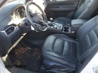 2018 Mazda CX-5 Grand Touring z VIN JM3KFBDM6J0337006, wystawiony jako Copart lot #87155694 z przebiegiem 50 643 mil mil oraz Szkoda całkowita • Salvage title. Historia ofert i sprzedaży dostępna na DreamBid. Obrazek 7.