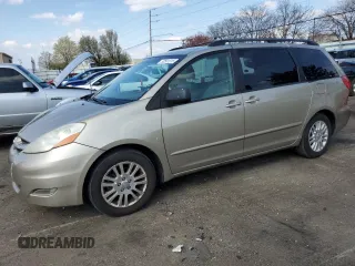 2010 Toyota Sienna XLE with VIN 5TDYK4CCXAS330463, listed as a Copart auction lot 52581315 with 226,668 mi miles and Salvage Title. Bid and sale history available at carsss.com. Image 1.
