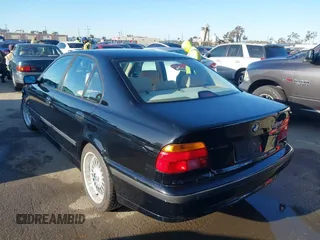 2000 BMW 5 Series 528iA with VIN WBADM6343YGU12629, listed as a IAAI auction lot 41963814 with 206,922 mi miles. Bid and sale history available at carsss.com. Image 3.