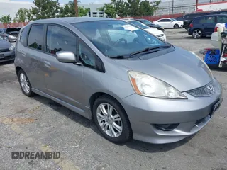 2009 Honda Fit Sport z VIN JHMGE88409S047860, wystawiony jako IAAI lot #42232769 z przebiegiem 170 014 mil mil oraz . Historia ofert i sprzedaży dostępna na DreamBid. Obrazek 1.