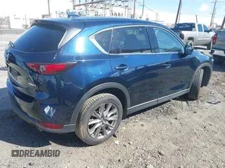 2020 Mazda CX-5 Grand Touring with VIN JM3KFBDM8L0807555, listed as a IAAI auction lot 41612906 with 40,518 mi miles. Bid and sale history available at carsss.com. Image 4.