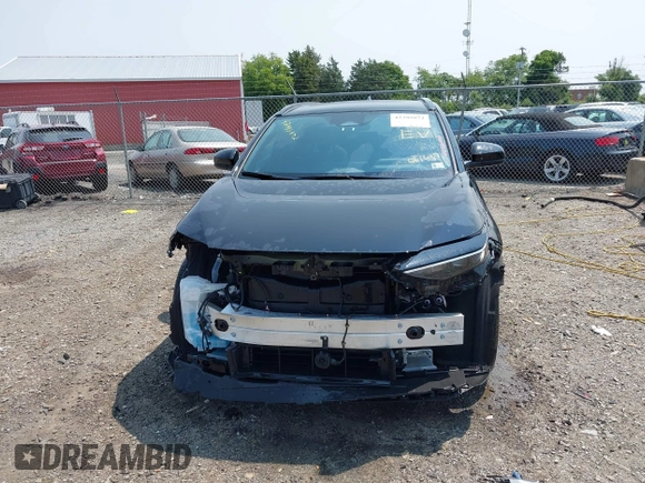 2024 Toyota bZ4X XLE with VIN JTMABACA7RA061457, listed as a IAAI auction lot 42395872 with 16,558 mi miles and . Bid and sale history available at DreamBid. Image 13.