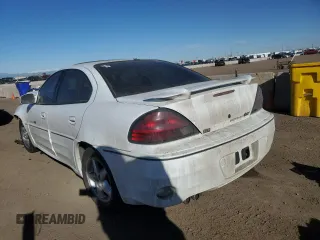2001 Pontiac Grand Am GT with VIN 1G2NW52E21C191578, listed as a Copart auction lot 46818625 with 69,987 mi miles and Salvage Title. Bid and sale history available at carsss.com. Image 2.