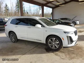 2020 Cadillac XT6 FWD Premium Luxury with VIN 1GYKPCRS3LZ137180, listed as a IAAI auction lot 41680583 with 68,937 mi miles. Bid and sale history available at carsss.com. Image 14.