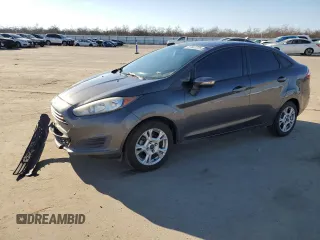 2015 Ford Fiesta SE with VIN 3FADP4BJ0FM115297, listed as a Copart auction lot 87942225 with 198,940 mi miles and Salvage Title. Bid and sale history available at DreamBid. Image 1.