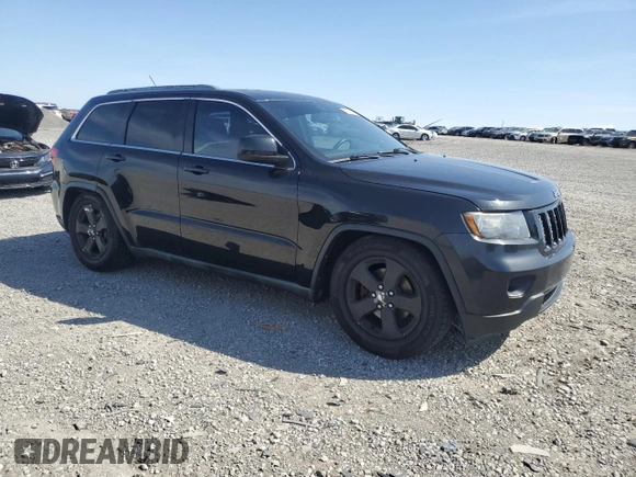 2011 Jeep Grand Cherokee Laredo z VIN 1J4RR4GG1BC544784, wystawiony jako Copart lot #52331015 z przebiegiem 177 131 mil mil oraz Szkoda całkowita • Salvage title. Historia ofert i sprzedaży dostępna na DreamBid. Obrazek 4.