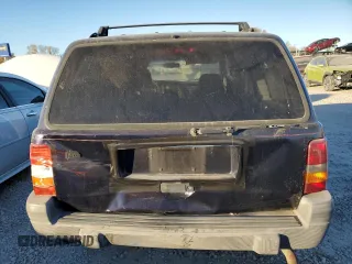 1997 Jeep Grand Cherokee Laredo with VIN 1J4GZ58S7VC685900, listed as a Copart auction lot 82105214 with 151,036 mi miles and Salvage Title. Bid and sale history available at carsss.com. Image 6.