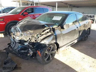 2017 Honda Civic Sedan Touring with VIN 19XFC1F97HE010119, listed as a IAAI auction lot 41310427 with 108,443 mi miles. Bid and sale history available at carsss.com. Image 16.