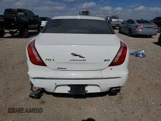 2014 Jaguar XJ with VIN SAJWA2GZ3E8V70365, listed as a Copart auction lot 42545995 with 65,649 mi miles and Salvage Title. Bid and sale history available at carsss.com. Image 6.
