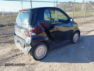 2015 Smart fortwo Passion with VIN WMEEJ3BA6FK804974, listed as a IAAI auction lot 42041904 with 97,514 mi miles and . Bid and sale history available at DreamBid. Image 4.