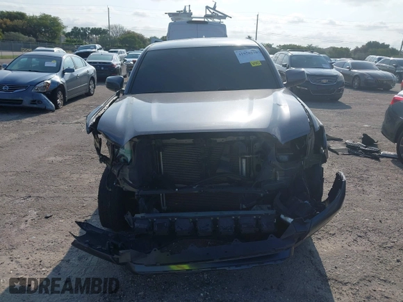 2021 Toyota Tacoma SR with VIN 3TYAX5GN9MT022049, listed as a IAAI auction lot 41958816 with 55,151 mi miles and . Bid and sale history available at DreamBid. Image 12.