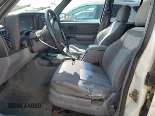 1998 Jeep Cherokee Sport with VIN 1J4FJ68S1WL259582, listed as a Copart auction lot 68115624 with 235,380 mi miles and Salvage Title. Bid and sale history available at carsss.com. Image 7.