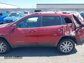 2016 Jeep Cherokee Limited z VIN 1C4PJMDS5GW226671, wystawiony jako IAAI lot #42249438 z przebiegiem 163 204 mil mil oraz . Historia ofert i sprzedaży dostępna na DreamBid. Obrazek 14.