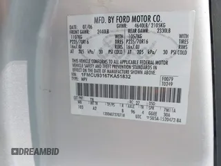 2007 Ford Escape XLT with VIN 1FMCU93167KA51832, listed as a IAAI auction lot 42115125 with 148,584 mi miles. Bid and sale history available at carsss.com. Image 9.