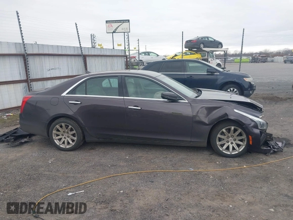 2014 Cadillac CTS Luxury RWD z VIN 1G6AR5S3XE0192441, wystawiony jako IAAI lot #41707095 z przebiegiem 205 904 mil mil oraz . Historia ofert i sprzedaży dostępna na DreamBid. Obrazek 13.
