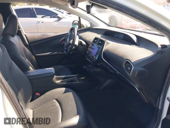 2020 Toyota Prius L Eco with VIN JTDKARFUXL3107211, listed as a IAAI auction lot 42797561 with 328,023 mi miles and . Bid and sale history available at DreamBid. Image 5.