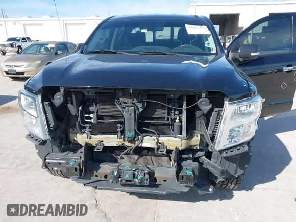 2020 Nissan Titan Platinum Reserve with VIN 1N6AA1EF0LN507232, listed as a IAAI auction lot 41432976 with 88,203 mi miles and . Bid and sale history available at DreamBid. Image 6.