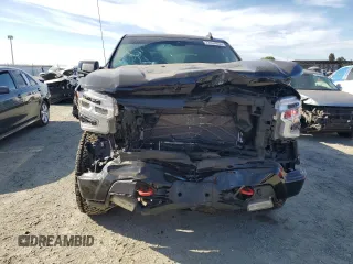 2023 Chevrolet Silverado 1500 LT Trail Boss with VIN 3GCUDFE80PG263652, listed as a Copart auction lot 72004854 with 25,461 mi miles and Salvage Title. Bid and sale history available at DreamBid. Image 5.