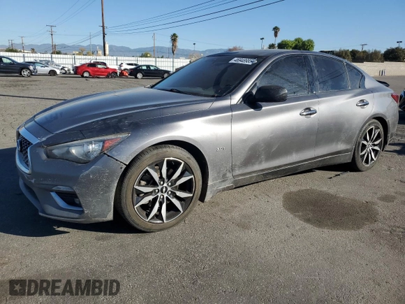 2019 Infiniti Q50 Luxe with VIN JN1EV7AP8KM514379, listed as a Copart auction lot 46948985 with 103,756 mi miles and Salvage title. Bid and sale history available at DreamBid. Image 1.