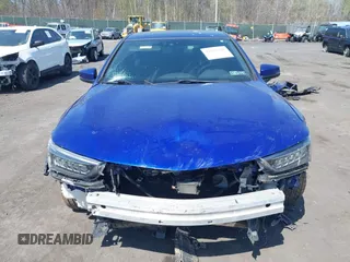 2018 Acura TLX w/A-SPEC Pkg with VIN 19UUB3F65JA006107, listed as a IAAI auction lot 42105820 with 129,268 mi miles and . Bid and sale history available at carsss.com. Image 6.