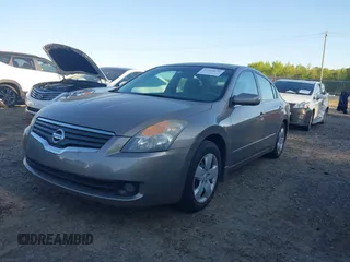 2007 Nissan Altima 2.5 S with VIN 1N4AL21E57N429039, listed as a IAAI auction lot 42026635 with 124,607 mi miles. Bid and sale history available at carsss.com. Image 2.