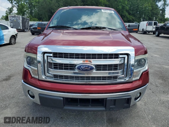 2014 Ford F-150 XL with VIN 1FTFW1CT7EKG41338, listed as a Copart auction lot 60037405 with 128,130 mi miles and Salvage title. Bid and sale history available at DreamBid. Image 5.