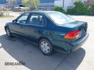 1998 Honda Civic EX with VIN JHMEJ8647WS001024, listed as a IAAI auction lot 41956420 with 198,954 mi miles. Bid and sale history available at carsss.com. Image 3.