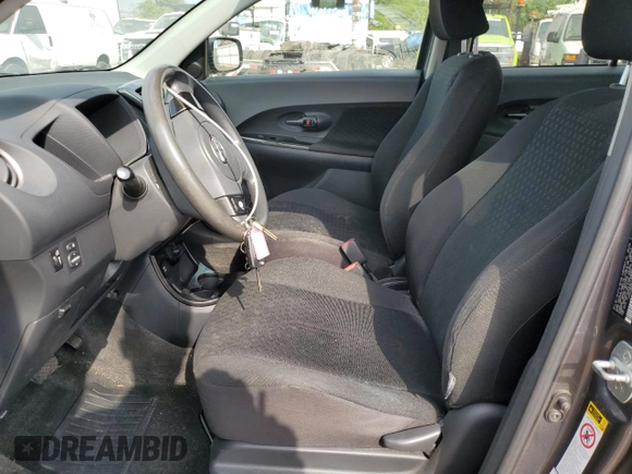 2010 Scion xD with VIN JTKKU4B48AJ052808, listed as a Copart auction lot 86248184 with 97,564 mi miles and Salvage Title. Bid and sale history available at carsss.com. Image 7.