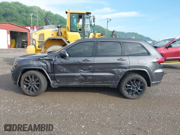2017 Jeep Grand Cherokee Laredo z VIN 1C4RJFAG1HC744669, wystawiony jako IAAI lot #42269885 z przebiegiem 123 271 mil mil oraz . Historia ofert i sprzedaży dostępna na DreamBid. Obrazek 14.