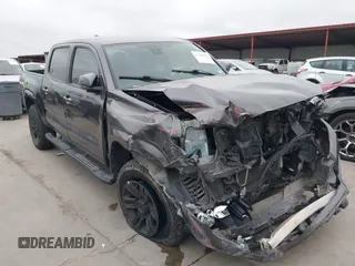 2021 Toyota Tacoma SR z VIN 5TFAX5GN9MX193549, wystawiony jako IAAI lot #41776412 z przebiegiem 50 331 mil mil oraz . Historia ofert i sprzedaży dostępna na DreamBid. Obrazek 1.