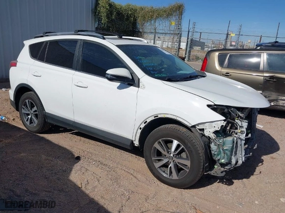 2017 Toyota RAV4 XLE with VIN JTMRFREV5HJ123412, listed as a IAAI auction lot 42018549 with 127,974 mi miles. Bid and sale history available at carsss.com. Image 1.