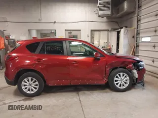 2013 Mazda CX-5 Touring with VIN JM3KE4CEXD0120913, listed as a IAAI auction lot 41973792 with 129,202 mi miles. Bid and sale history available at carsss.com. Image 13.