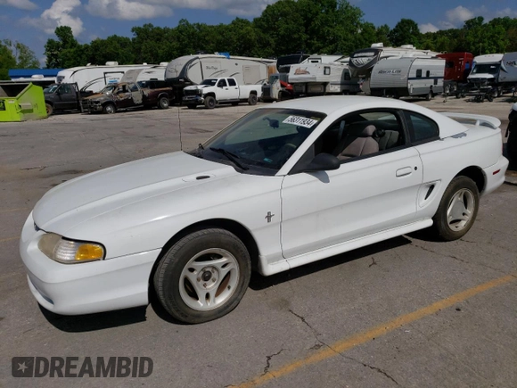 1996 Ford Mustang with VIN 1FALP4041TF206244, listed as a Copart auction lot 56311934 with 123,572 mi miles and Salvage Title. Bid and sale history available at carsss.com. Image 1.