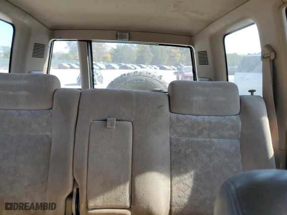 2000 Isuzu Trooper S with VIN JACDJ58X2Y7J11793, listed as a Copart auction lot 77431754 with 214,854 mi miles and Clean Title. Bid and sale history available at carsss.com. Image 10.