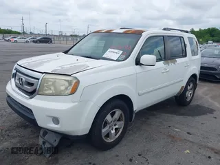 2011 Honda Pilot EX with VIN 5FNYF3H48BB029583, listed as a IAAI auction lot 42096963 with 263,545 mi miles and . Bid and sale history available at carsss.com. Image 14.