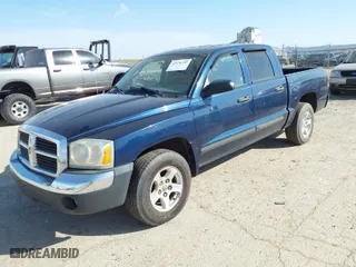 2005 Dodge Dakota SLT with VIN 1D7HE48N55S163580, listed as a IAAI auction lot 41776155 with 164,671 mi miles. Bid and sale history available at carsss.com. Image 2.