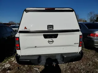 2022 Nissan Frontier S with VIN 1N6ED1CM9NN658423, listed as a Copart auction lot 68548234 with 33,229 mi miles and Salvage Title. Bid and sale history available at carsss.com. Image 6.