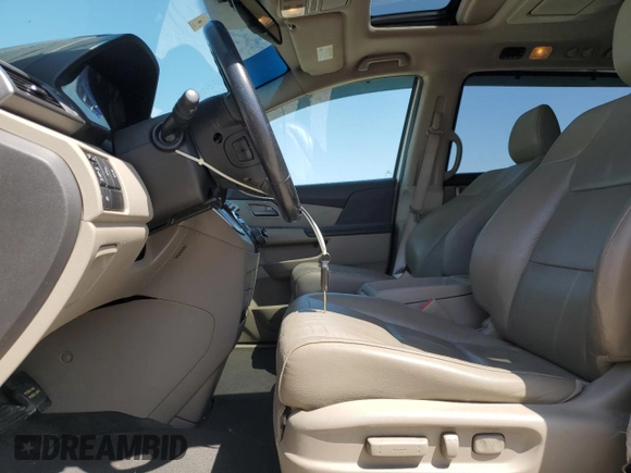 2013 Honda Odyssey Touring with VIN 5FNRL5H94DB021388, listed as a Copart auction lot 52582775 with 141,566 mi miles and Salvage Title. Bid and sale history available at carsss.com. Image 7.