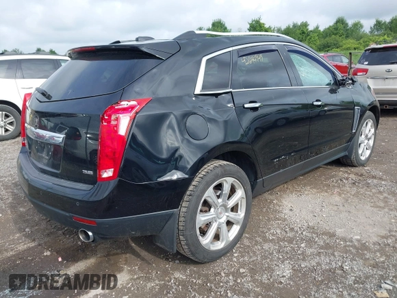 2015 Cadillac SRX Performance Collection with VIN 3GYFNFE35FS591343, listed as a IAAI auction lot 42644949 with 118,718 mi miles and . Bid and sale history available at DreamBid. Image 4.