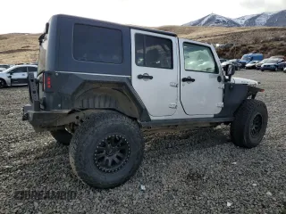2009 Jeep Wrangler Unlimited Rubicon with VIN 1J8GA69139L703848, listed as a Copart auction lot 43614645 with 172,801 mi miles and Salvage title. Bid and sale history available at DreamBid. Image 3.