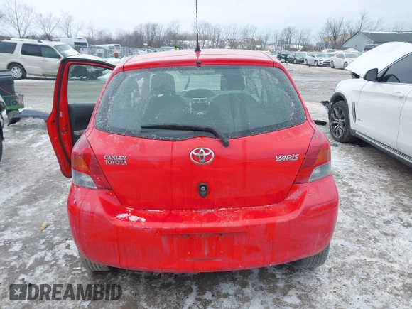 2011 Toyota Yaris with VIN JTDJT4K34B5329980, listed as a IAAI auction lot 41393540 with 84,987 mi miles. Bid and sale history available at carsss.com. Image 17.