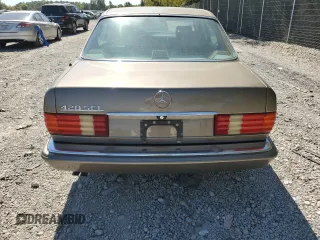1987 Mercedes-Benz 420 with VIN WDBCA35D0HA311262, listed as a Copart auction lot 71760554 with 185,520 mi miles and Salvage Title. Bid and sale history available at carsss.com. Image 6.