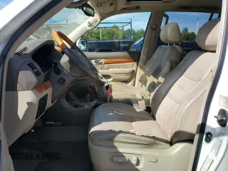 2004 Lexus GX 470 with VIN JTJBT20XX40033938, listed as a Copart auction lot 70871164 with 214,565 mi miles and Salvage Title. Bid and sale history available at carsss.com. Image 7.