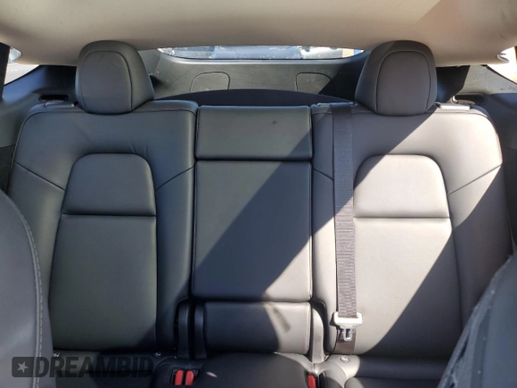 2023 Tesla Model Y Performance with VIN 7SAYGDEF2PF828973, listed as a Copart auction lot 45276585 with 15,750 mi miles and Salvage Title. Bid and sale history available at DreamBid. Image 10.